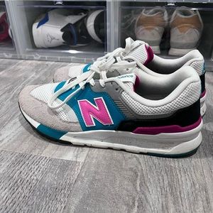 New Balance tennis shoes.